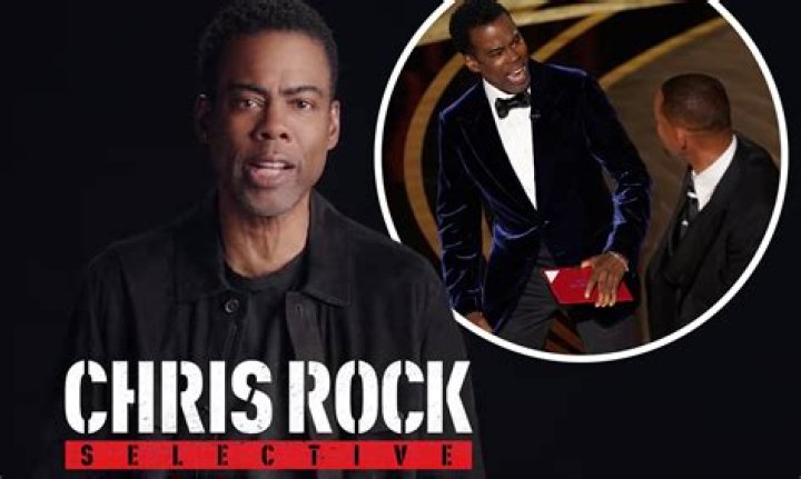 Chris Rock cuts a relaxed figure in a green check flannel shirt and
