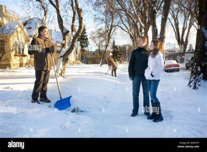 Couple Shot While Shoveling Snow (James Goy) (Lisa Goy) (James Spaide