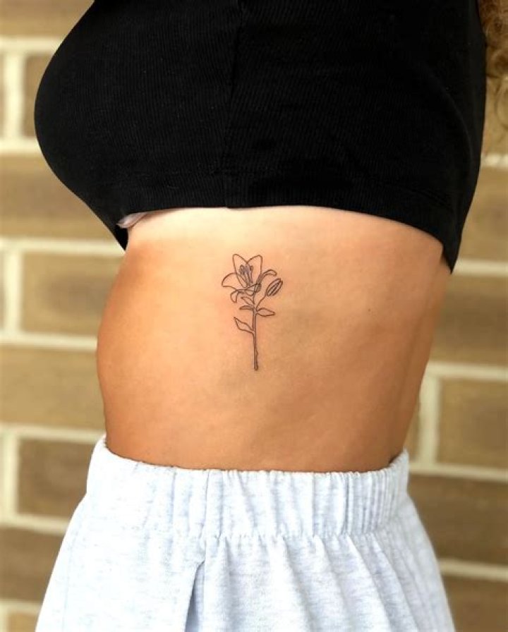 Exquisite Rib Flower Tattoo Designs: A Timeless Symbol Of Beauty