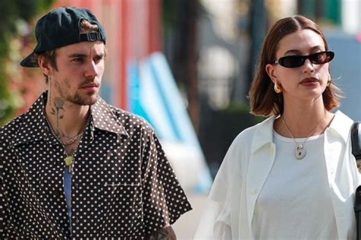 Hailey Bieber Wears Her ‘B’ Necklace While on Romantic Stroll with