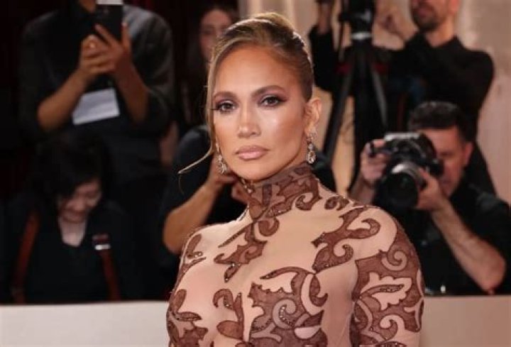 Jennifer Lopez Blooms in Sheer Floral Dress at Ralph Lauren Spring 2024