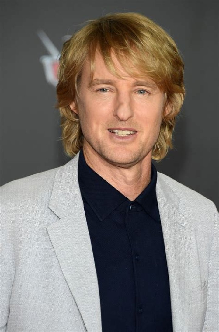 Owen Wilson the 'Butterscotch Stallion' shares a kiss with onagain