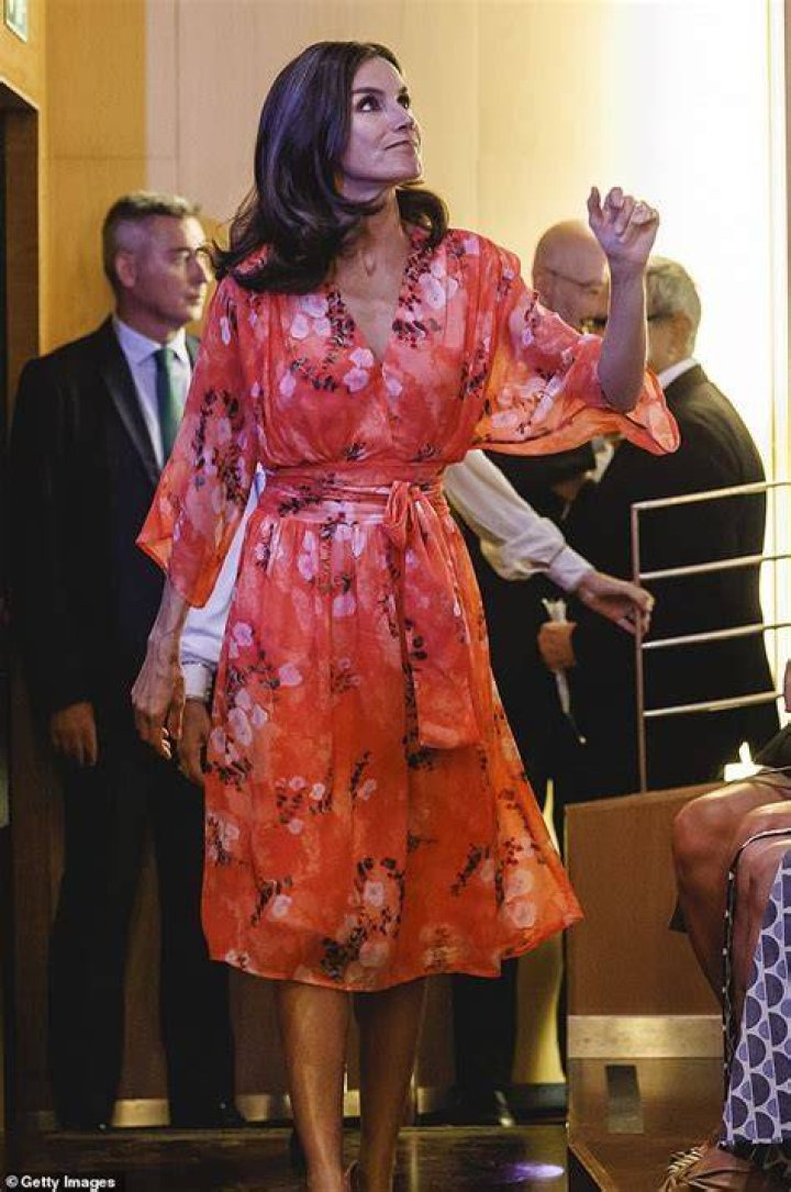 Queen Letizia stylish in scarlet at awards ceremony with King Felipe in
