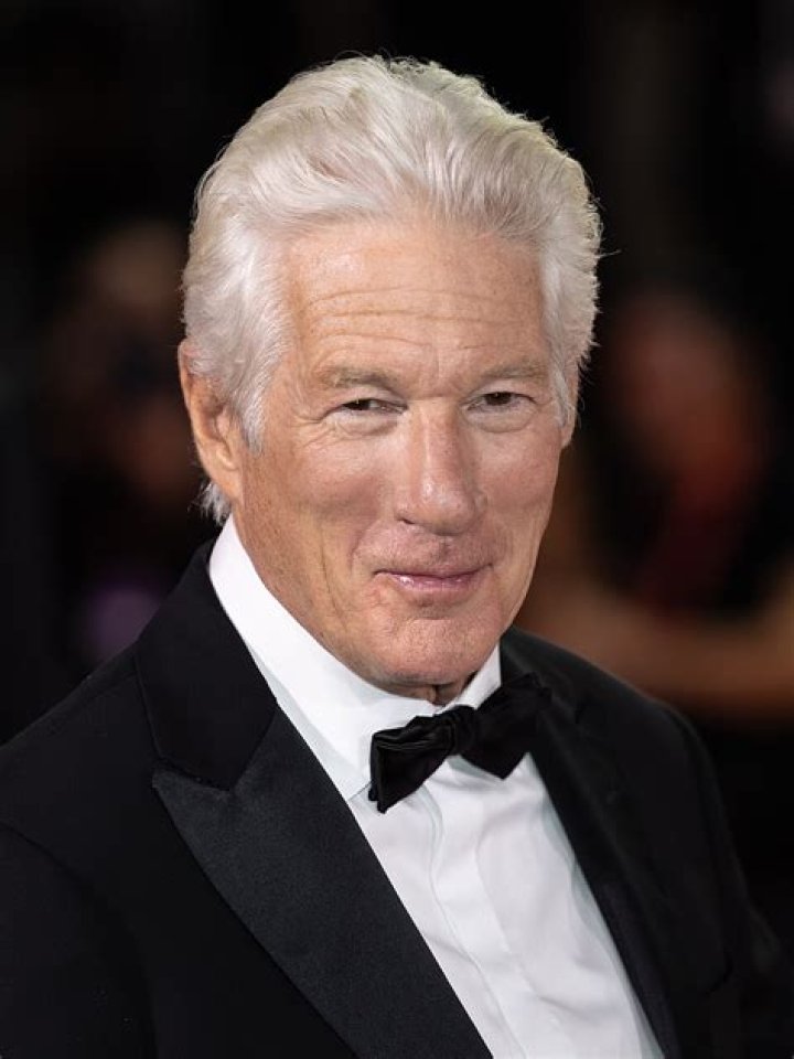 Richard Gere has passed on his infectious charm and handsome looks to