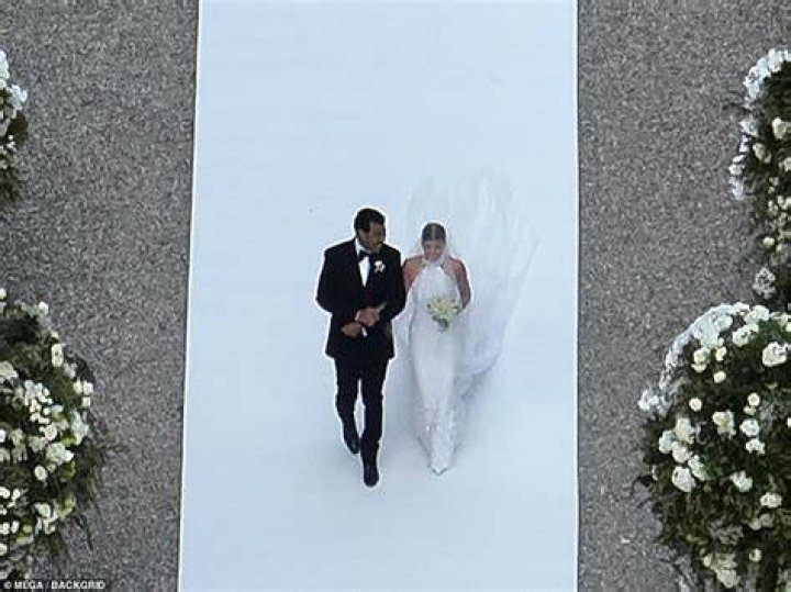 Sofia Richie is walked down the aisle by dad Lionel during lavish