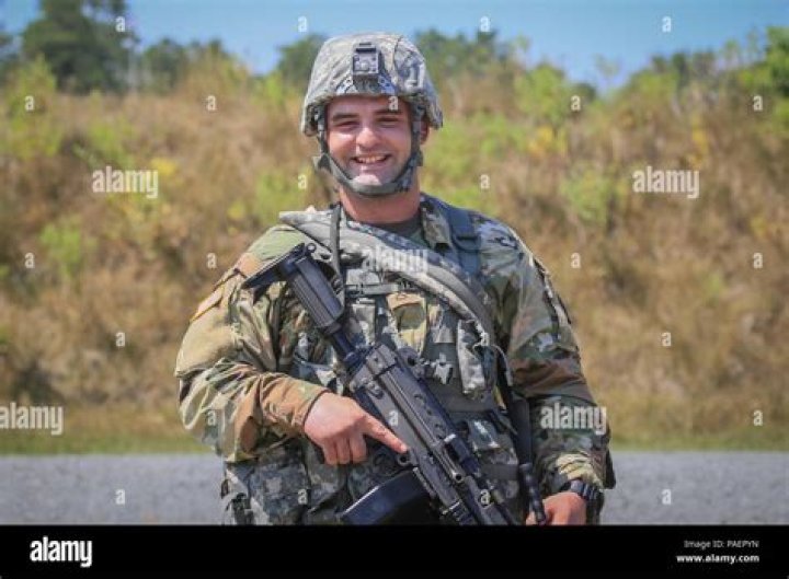 U.S. Army Pfc. Patrick Davis, left, and Staff Sgt. Joshua Tyree, right